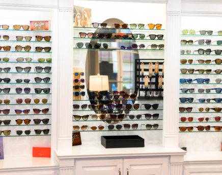 Accent Vision Care optical shop with large display of sunglasses in Gonzales