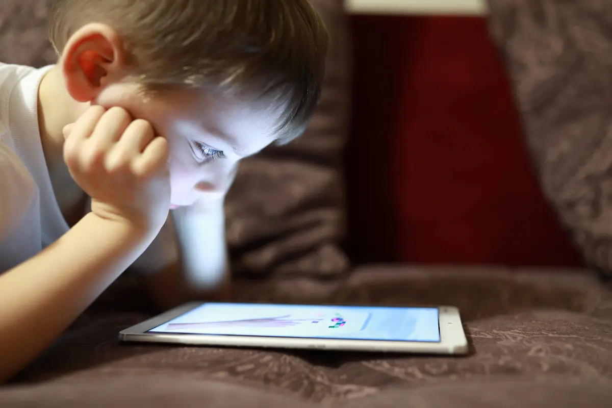 Child looking at tablet